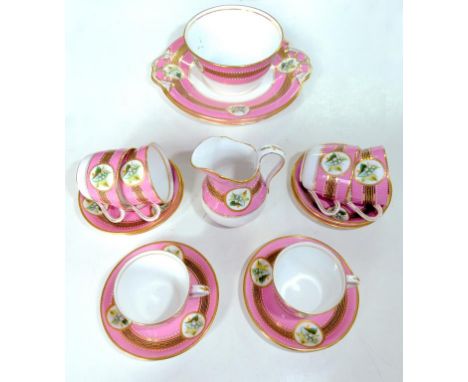 A STAFFORDSHIRE BONE CHINA ROSE POMPADOUR GROUND TEA SERVICE, PAINTED WITH MEDALLIONS OF LILY OF THE VALLEY ON A GILT BAND, 7