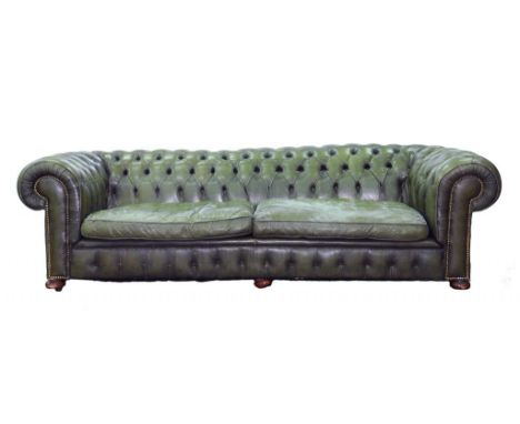 A GREEN HIDE CHESTERFIELD SOFA, APPROX 250 CM WIDE (LACKS BACK FEET)