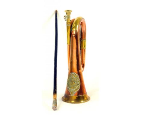 MILITARIA.  AN ARGYLE AND SUTHERLAND HIGHLANDERS OFFICER'S CANE, THE NICKEL BRASS POMMEL WITH EMBOSSED INSIGNIA, AND A BUGLE 