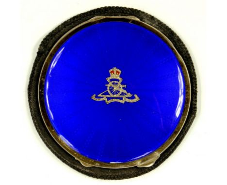 A SILVER AND BLUE TRANSLUCENT ENAMEL ROYAL ARTILLERY REGIMENTAL COMPACT, THE BACK ENGINE TURNED, CIRCA 1940 
