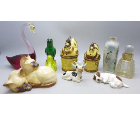 A Beswick Siamese cat figure, a Royal Doulton Jack Russell dog figure, a/f, a Szeiler ceramic small cow, a/f, a green Chinese