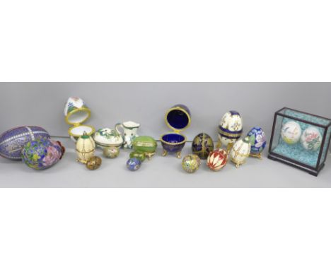 A collection of decorative egg ornaments and trinket boxes including cloisonné and Russian made 