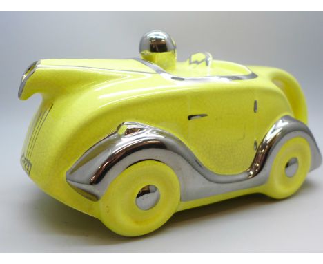 A Sadler racing car teapot in yellow and silver, OK T42