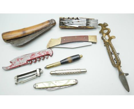 A Rogers of Sheffield combination pocket knife, with antler handle, a horn handle pocket knife, other knives and corkscrew, e