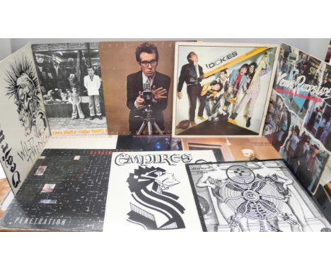 Sixteen Punk and New Wave LP records and 12" singles comprising of Siouxsie and the Banshees, Tubeway Army, Dickies, Elvis Co