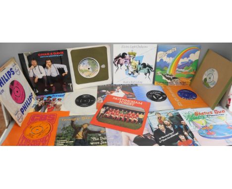 A  large collection of 45 rpm 7" singles, comprising of Status Quo, Blondie, Stevie Wonder, Culture Club, The Rolling Stones,
