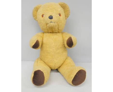A vintage Teddy Bear with jointed limbs 