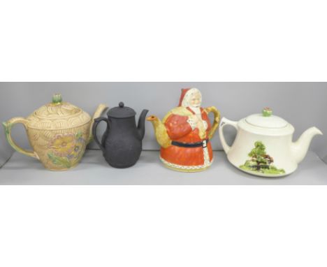 Four tea pots; musical teapot, O Dear Augustin melody, 'Wild Flowers' teapot, ‘Lucky Santa Claus' teapot, registered 835842 a