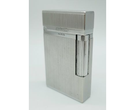 A St. Dupont Paris France lighter, brushed metal finish *This lot is not available for packing and posting