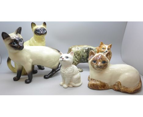 Five ceramic cat figures, including Beswick, Coopercraft, Tey and Rushton pottery, Isle of Man