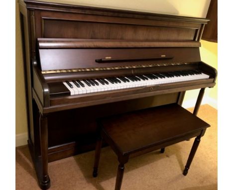 Rippen (c1984) A 'Romance' Model upright piano in a satin cherry wood case; together with a matching piano bench.
