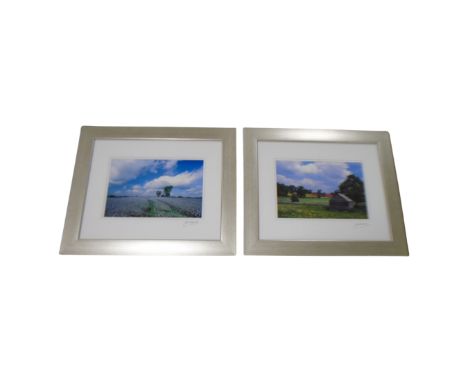 Six photographic colour prints signed by John Williamson depicting landscapes and coastal scenes.