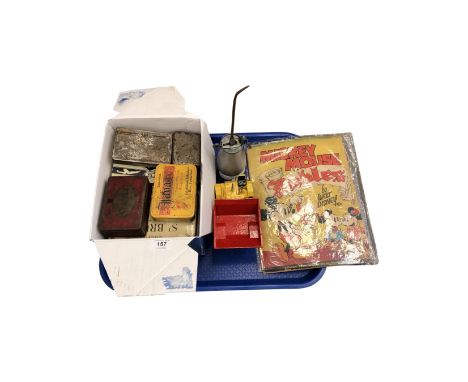 A tray containing die cast truck, vintage tins, vintage oil can and a 1930's Mickey Mouse comic. 