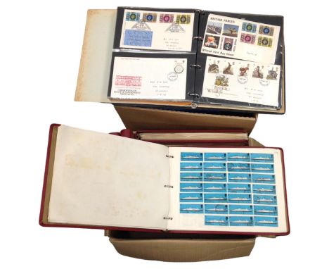Two boxes containing files of First Day Covers and stamps.