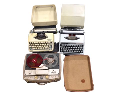 Two vintage typewriters, Olympia and Silver Reed, together with a Fidelity reel to reel player.