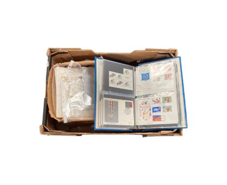 A box containing two albums of First Day Covers etc.