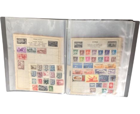 A folio containing a large selection of old stamps, franked &amp; unfranked, together with a quantity of franked loose stamps