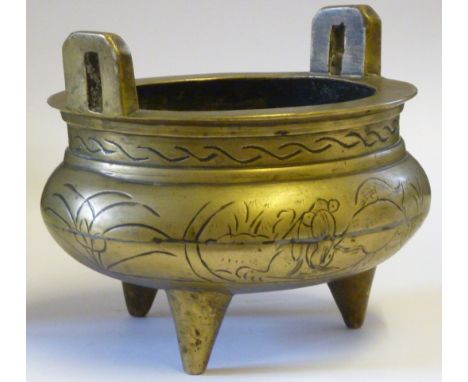 A heavy Chinese brass/bronze tripod Censer of typical form, six character seal mark to underside, 12cm diameter (probably lat