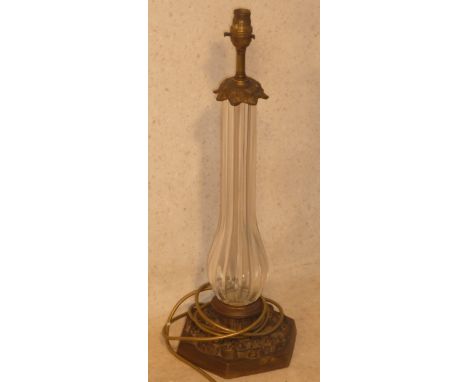 An early 20th Century French crystal and brass mounted Table Lamp (for re-wiring), the fluted glass stem terminating in a bul