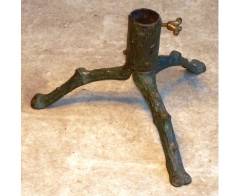 An unusual 19th Century painted cast iron Christmas Tree Stand, the tripod base modelled as branches etc., with original gold