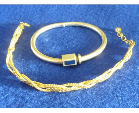 A ladies heavy hallmarked silver Bangle, the hexagonal screw clasp set with three rectangular lapis lazuli tablets, together 