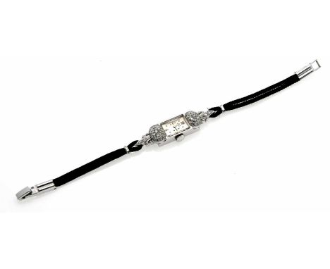 Art Deco Diamant Damenuhr, Handaufzug Kal. T31 läuft, WG 585/000, weißes Zifferblatt bez. NIVADA Grenchen, mit 34 Diamanten c