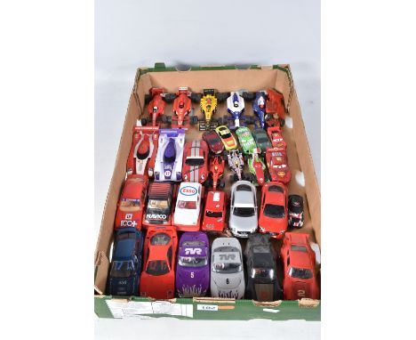 A QUANTITY OF UNBOXED AND ASSORTED SCALEXTRIC AND CARRERA SLOT RACING CARS, mainly modern items but does include Scalextric M