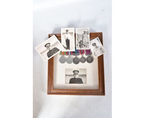 A FRAMED WWII AND LATER OFFICERS MEDALS, to include a GSM and LSGC, the medals are mounted for wearing on a bar and contain t