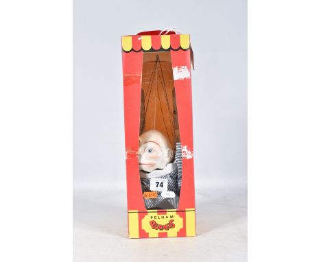 A BOXED PELHAM HUMPTY DUMPTY PUPPET, appears complete and in fairly good with only minor wear, contained in a damaged striped