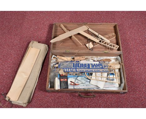 A WOODEN BOX CONTAINING A QUANTITY OF PART BUILT VINTAGE BALSA WOOD GLIDERS, together with assorted lengths of balsa, spare p