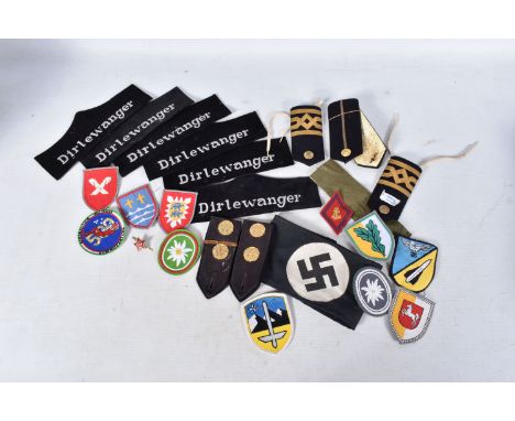 A BOX OF MILITARIA, to include a black and white Nazi armband that is a copy of a Danish socialist group, size Dirlewangar ba