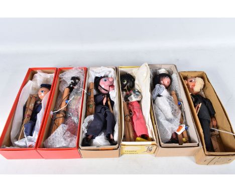 SIX BOXED PELHAM SL AND SM PUPPETS, Golly (x 2), Policeman (with truncheon), Nurse, Sailor and Schoolmaster (with cane but mi