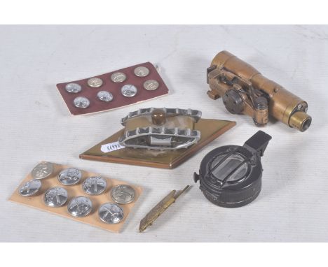A SHERMAN TANK TELESCOPE, WWII compass, NFS buttons, trench art style tank and tank cap badge, the telescope is brass and has