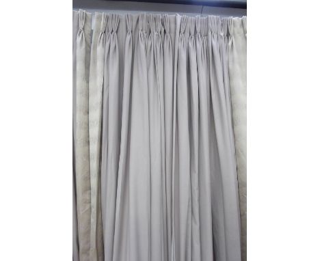 CURTAINS, two pairs, with a patterned leading edge, lined and interlined, one pair each curtain approx 125cm W gathered, the 