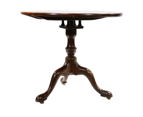 Georgian mahogany 'bird-cage' table, circular top, turned column, tripod legs, diameter 81cm, height 69cm.Condition report:Pl