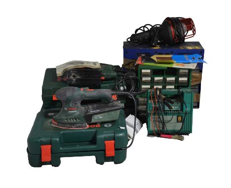 Three boxed Bosch tools, battery charger, various nuts and bolts and a light.