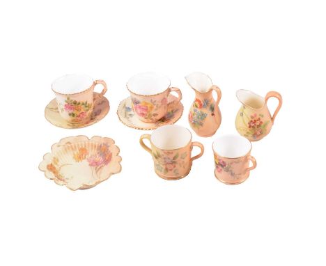 Small group of Royal Worcester ivory ground porcelain teaware, floral decoration, including coffee cans, miniature jugs, mini