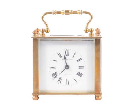 Small brass carriage clock timepiece, rectangular white enamelled dial with black Roman numerals, signed Wagland &amp; Son, W