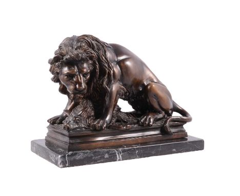 Follower of Antoine-Louis Barye, reproduction bronze model of a lion and boar, on a marble plinth, width 29cm.