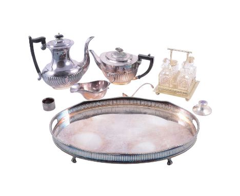 A silver pin dish, SJR Birmingham 1970, raised on four claw feet, width 12cm; a silver inkwell with purple enamelled guilloch