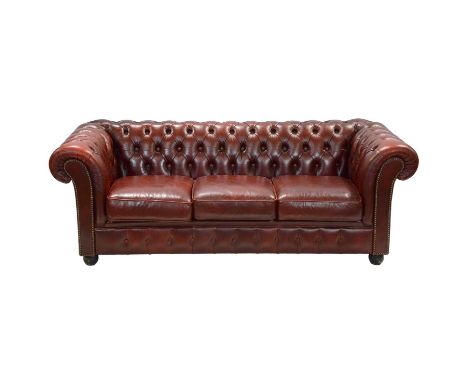 Modern red leather Chesterfield sofa, length 195cm, depth 85cm, height 70cm.