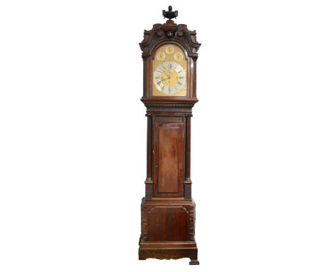 Edwardian mahogany longcase clock, of large size, the case with urn finial, shaped hood with swan neck pediment, Corinthian e