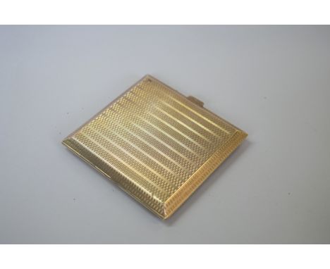 An engine turned 9ct gold cigarette case, 101g.