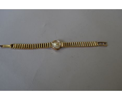 A 9ct gold Rotary ladies mechanical wristwatch. Condition Report: The strap and case are both hallmarked 375.
Weight: 18.9g e