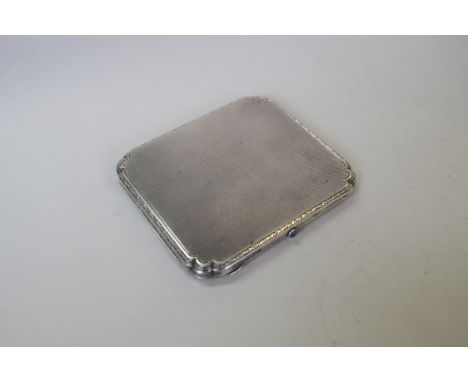 A continental engine turned white metal and blue enamel cigarette case, 8.5 x 7.5cm. Condition Report: some scratching to the
