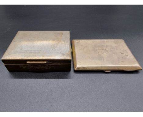 An engine turned silver cigarette box; together with a silver cigarette case, 191g weighable. 