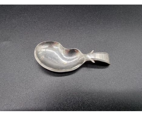 A George III silver caddy spoon, having&nbsp;kidney shaped bowl, by Cocks &amp; Betteridge, Birmingham 1812, 9.75cm, 7.3g. 