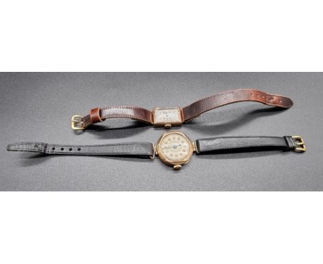 A 1940s 9ct gold ladies manual wind wristwatch,&nbsp;21mm, on brown leather strap; together with another ladies 9ct gold wris