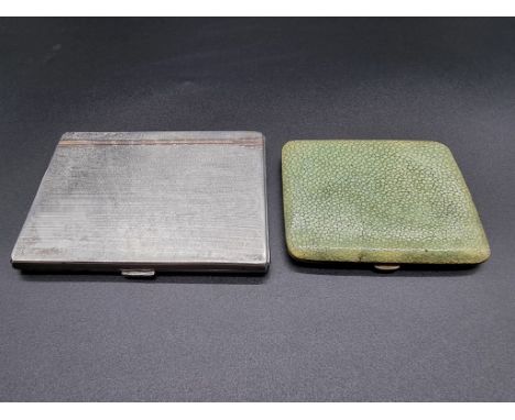 An engine turned silver cigarette case, by W N Ltd, Birmingham 1934, 11.5 x 8.5cm, 177g; together with another smaller shagre