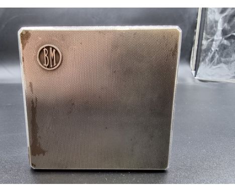 An engine turned silver cigarette case, by Asprey &amp; Co Ltd, Birmingham 1935, 8.5 x 8cm, 117g. 